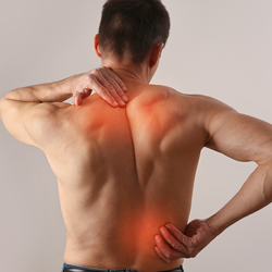 Man holding his neck and lower back indicating pain points